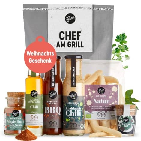 Weihnachtlicher Grillkorb für Männer mit leckeren Grillsaucen, Chili-Öl, Gewürzrub, Salz und Grissini  perfekte Grillgeschenkidee.